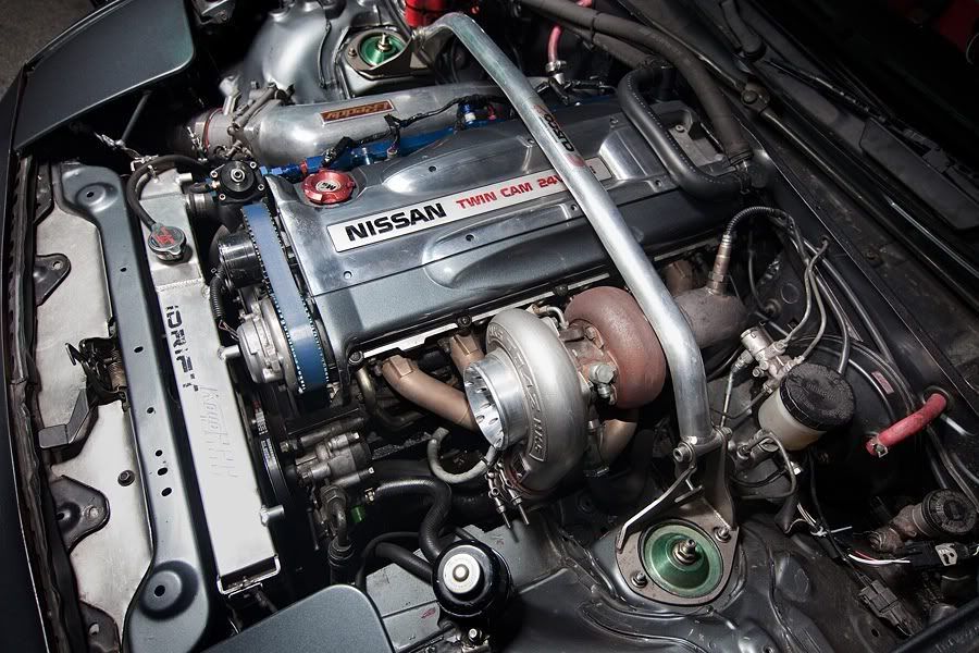 RB26 inside Mazda Miata engine bay